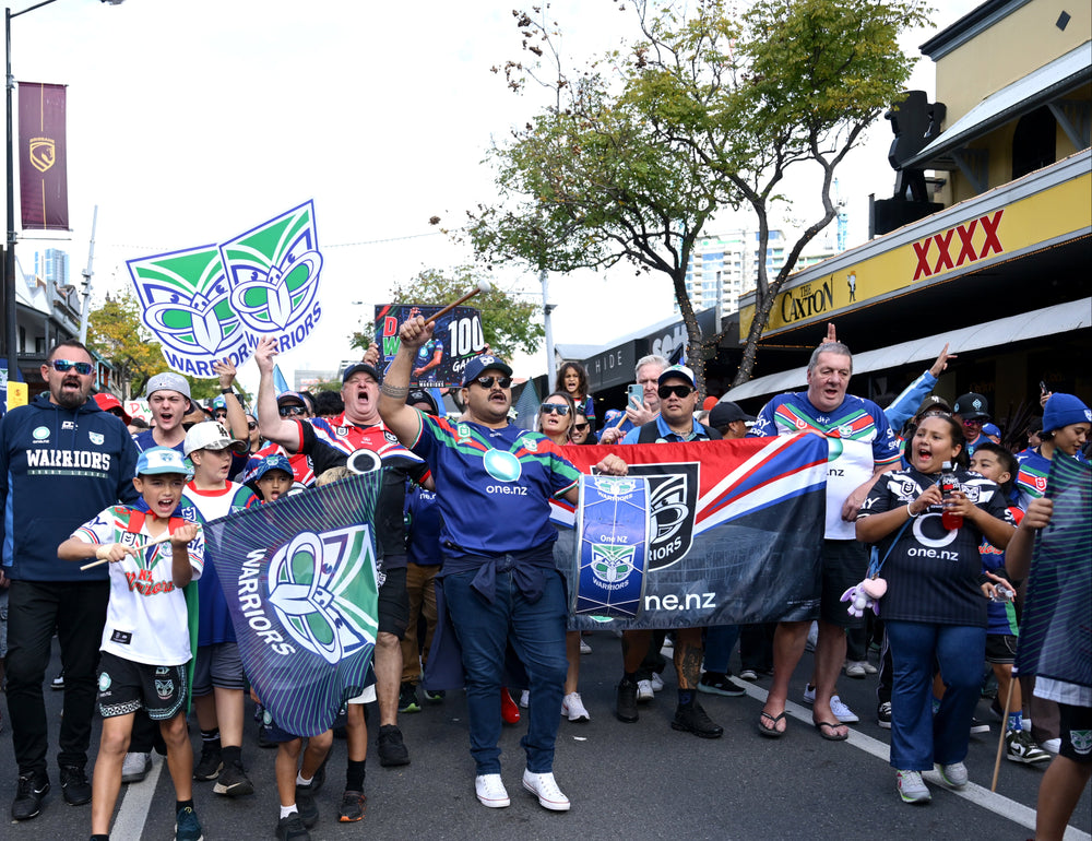 Supporter holding a Sports Head