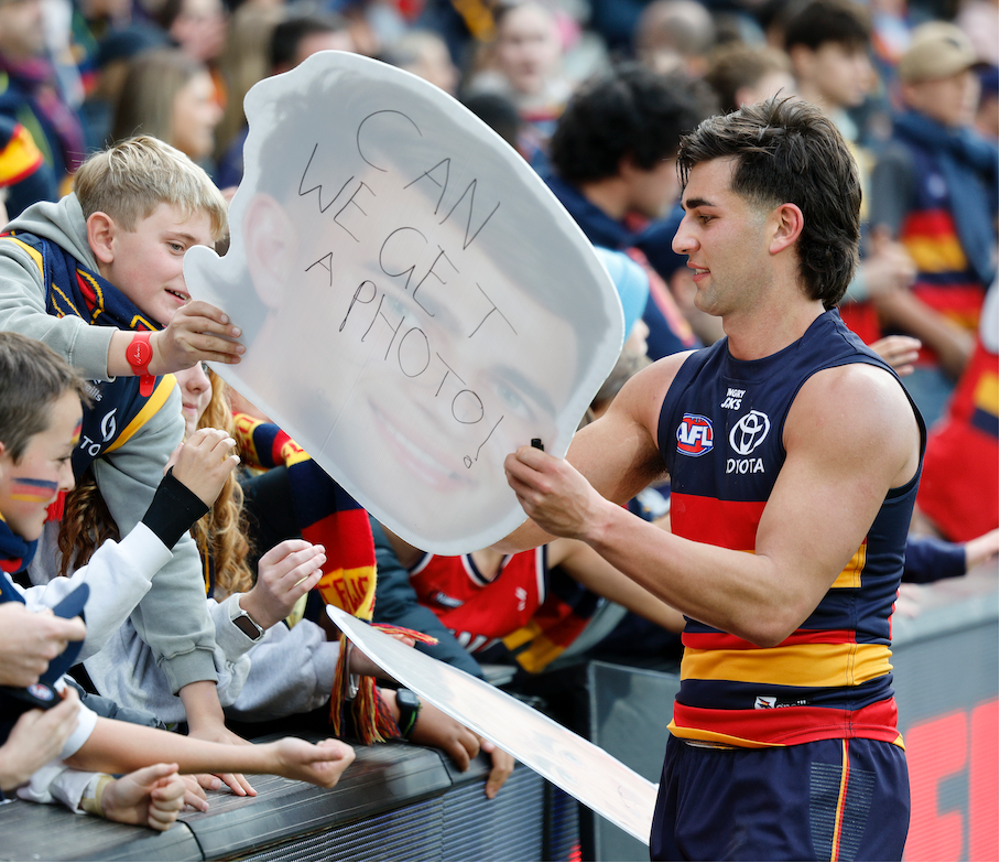 Fans celebrating with Sports Heads