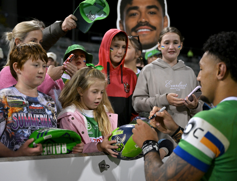 Fans celebrating with Sports Heads